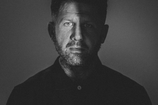 a model portfolio of a tattooed barber